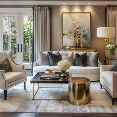 a living room with couches, chairs and tables in front of sliding glass doors