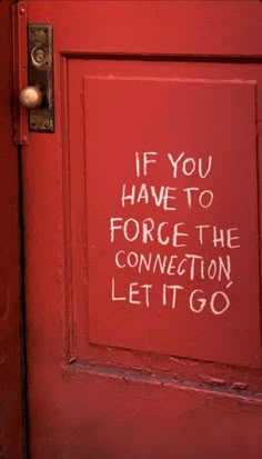 a red door with graffiti written on it and the words if you have to force the connection let go