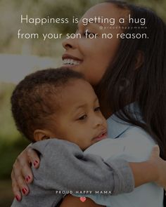 a woman holding a child with the caption happiness is getting a hug from your son for no reason