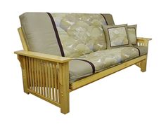 a wooden futon with pillows on it