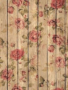 an old wooden background with roses on it