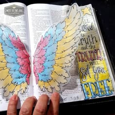 someone is holding an open bible with colorful wings on it and the words, truth and truth are written in bright colors