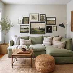 a living room filled with lots of furniture and pictures on the wall above it's couch