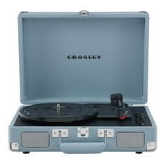 an open suitcase with a record player in it