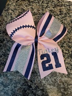 Custom softball bow with custom colors/ name and number. Bow is fully customizable. PRIMARY Color is Ribbon Color When ordering please list all names and numbers in personalization. Bow measures approx 7x7 and comes on a hair tie. Clips are not offered at this time. Cheer Bows Ideas, Hair Accesorios, Softball Team Mom, Kids Volleyball, Softball Hair Bows, Volleyball Bows, Softball Cheer, Softball Hair, Softball Bow