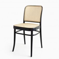 a black chair with wicker seat and backrests on an isolated white background