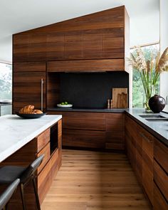 Wood Kitchen Wood Modern Kitchen Cabinets, Mid Japandi, Pacific Northwest Kitchen, Colorful Cabin, Soapstone Kitchen, Walnut Kitchen Cabinets, Modern Beach Home, Modern Wood Kitchen