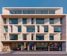 an architectural rendering of a building with many windows