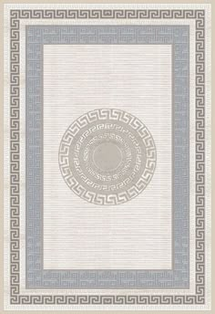 a white rug with blue and grey greek designs on the border, in front of a beige background