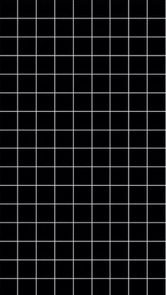 a black and white tiled wall with squares in the middle, as well as an image of