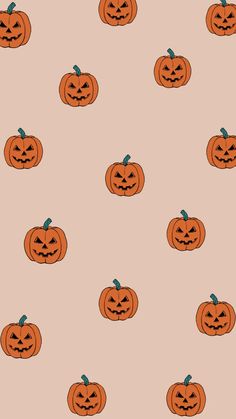 an orange pumpkin pattern on a pink background