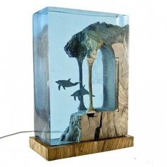 a glass block with some animals in it