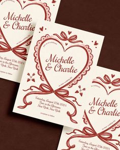 three wedding cards with hearts on them and ribbons in the shape of a heart are shown