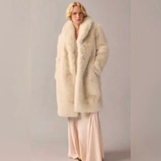 Brand New With Tags. Covetable And Limited Edition. 100% Polyester. Snap Closure. Welt Pockets. Lined. Dry Clean. Imported. Relaxed Fit. Body Length: 41". Sleeve Length: 31 3/4". Hits Above Knee. Luxury Spring Outerwear With Faux Fur Lining, Classic Fitted Faux Fur Outerwear, Luxury Winter White Long Sleeve Fur Coat, Cream Fitted Fur Coat For Fall, Long Fur Coat For Workwear, Fitted Cream Fur Coat For Fall, Classic Fall Fur Coat, Luxury Faux Fur Spring Coat, Luxury Fitted Fur Coat For Spring