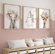 three framed pictures hang on the wall above a wooden bench with pillows and pillow cases