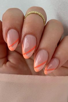 Orange nail designs evoke the lively spirit of summer, reminiscent of sunny days and refreshing treats. From sunset-inspired ombré to creamy, citrusy hues, there are endless creative ways to incorporate shades of orange into your manicure.  summer, spring, fall, winter, natural nails, acrylic, gel nails, dip nails, nail art, oval, squoval, square, almond, round, pink and, short, burnt, blue and, light, red, black and, yellow and, short, coffin. Summer French Nails, Unghie Sfumate, Orange Nail Designs, Orange Nail, Peach Nails, Almond Nails Designs, Oval Nails, Orange Nails, Minimalist Nails