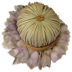 A charming 1960s Miss Alice floral petal brimmed Mod style hat: the brim is made of cool-toned lavender petals and the crown is covered in pale green silk stems. It's banded with a braided straw rope. Originally sold at Lord & Taylor. One size. Bouquet Hat, Lavender Petals, It Band, Lavender Floral, Mod Style, Mod Fashion, Green Silk, Fashion Mode, Pale Green