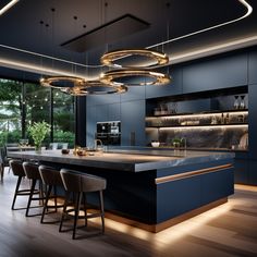 a modern kitchen with an island counter and bar stools in the center, surrounded by large windows