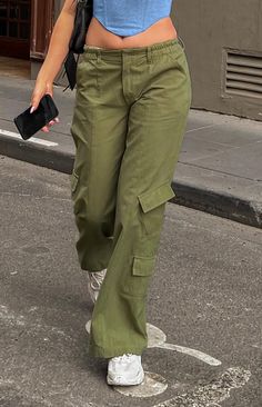 * Khaki Low Rise Cargo Pants 
 * These low rise khaki pants () are super cool and stylish! Grab sunnies () and a bag () for an off duty fit that you're sure to love. Be sure to pair with a cute crop () and gold jewellery () to complete this look!  
 * 
 
 * Elasticated waistline 
 * Zip closure on the front 
 * Unlined 
 * Full length 
 * Belt loops 
 * 6 pockets- 4 on the front, 2 on the back Low Rise Khaki Pants Outfit, Low Rise Cargo Pants, Shop Pants, Summer Playsuit, Crochet Sandals, Sweater Crop, Strapless Tops, Crop Top Sweater, One Shoulder Tops