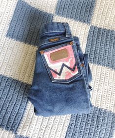 Western Painted Jeans, Pink Wrangler Jeans, Western Jean Painting, Cow Print Pocket Jeans, Bell Bottom Jeans Cow Print, Colorful Wrangler Jeans, Western Jeans, Cowgirl Accessories, Vintage Wrangler