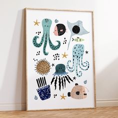 an octopus, starfish, jelly fish and other sea creatures are featured in this art print