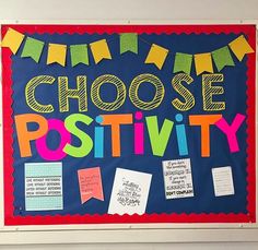 a bulletin board that says choose positivity and has colorful writing on the front