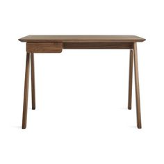 the desk is made from wood and has two legs on each side, with one drawer open