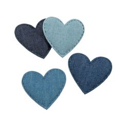 three denim hearts are shown on a white background