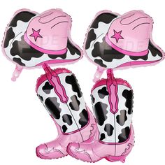 two pink and black cowboy boots shaped balloons