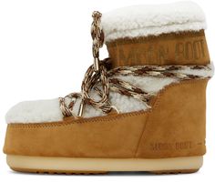 Ankle-high paneled shearling and suede boots in tan and off-white. · Lace-up closure · Self-tie drawstring at collar · Logo printed in gold-tone at collar · Embossed logo at heel · Insulated shearling lining · Textured rubber midsole in off-white · Treaded rubber outsole in tan Supplier color: Whisky/Off white Heeled Chelsea Boots, Boots Flat, Moon Boot, Patent Leather Boots, Shoes Boots Ankle, Leather Lingerie, Ankle Boots Flat, Moon Boots, Brown Ankle Boots