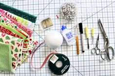 sewing supplies laid out on a cutting mat