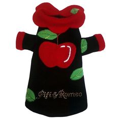 a black dog sweater with an apple on it