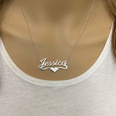 Description: 925 Sterling Silver Name Plate Heart Necklace - Jessica Item No.: C01 Metal Type: .925 Sterling Silver With Stamped 925 Finish: High Polish Measurement: 16" - 18 Inches. Pendant: 1.5" X 0.75" Brand New With Box Sterling Silver Name Necklace As A Gift For Her, Heart-shaped Sterling Silver Jewelry With Silver Clasp, White Gold Heart-shaped Jewelry With Sterling Silver Clasp, Stamped 925 Necklaces For Mother's Day, Stamped 925 Silver Necklaces For Mother's Day, Personalized Sterling Silver Heart Necklace For Mother's Day, Heart Shaped Sterling Silver Necklace, Classic Sterling Silver Jewelry For Valentine's Day, Sterling Silver Name Necklace In White Gold