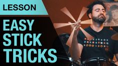 a man playing drums with the words easy stick tricks