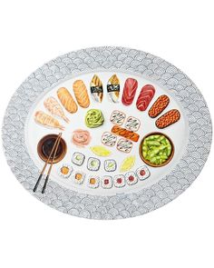 sushi platter with chopsticks and sauce on white background, top view