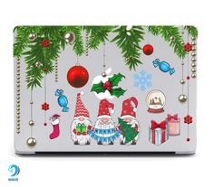 a laptop with christmas decorations on it