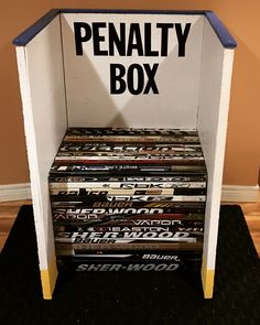 the penalty box is stacked on top of each other in an empty room with carpeted flooring