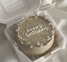 a birthday cake with the words happy birthday written on it