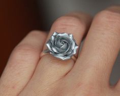 Silver rose made of polymer clay. Material of band- sterling silver Floral ring with sculpted flower EACH PETAL MADE BY HAND Dia rose about 15 mm/ 0,59 inch THE BASE IS ADJUSTABLE: sterling silver 925 base 5.5-8 or 7-9 size The ring is adjustable and can fit any size by gently pushing together the ends, overlapping them or gently pulling them apart. Before sending I will place this ring in small box ♥All my rings come in boxes.. If you are purchasing a gift I will wrap the box in tissue paper .I Ring Polymer Clay, Silver Rose Ring, Polymer Clay Flower Jewelry, Flower Rings, Flower Statement Necklace, Rings Sterling Silver, Clay Flower, Floral Jewelry, Floral Ring