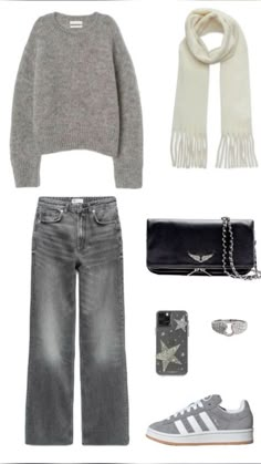 a woman's outfit including jeans, sweater and shoes