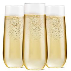 three champagne flutes filled with liquid on a white background