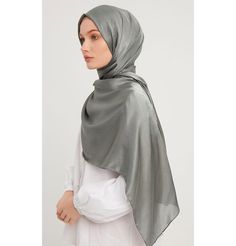 Shine Hijab Shawl - Sage Grey Glossy in texture and elegant in appearance, our shine shawl is set to be the next great addition to your wardrobe! Its sleek shine makes for an impressive final touch to formal wear so you could look and feel your best on any special occasion. FEATURES: - Glossy finish - Suitable for all seasons - Opaque (not transparent) MATERIAL: - 75 cm x 185 cm - Polyester CARE: - Hand wash separately in cold water. - Lay flat to dry. - Iron on low without steam. Made in Turkey Transparent Material, Final Touch, Formal Wear, Lay Flat, Steam, Cold Water, Shawl, Special Occasion, The Next