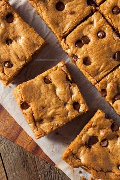 chocolate chip cookie bars cut into squares on a cutting board