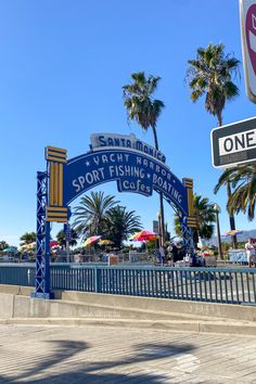 there is a blue and white sign that says sport fishing