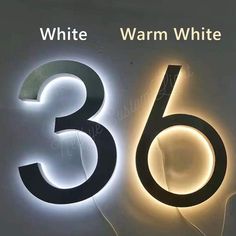 the numbers are lit up in black and white, which is also part of an illuminated sign