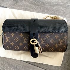 Measuring 7.2’ X 3.7’ X 2.9’ Inches Louis Vuitton Glasses Case Bag From The Fall Winter 2018 Collection. Created By Nicolas Ghesquiere Only Used Once At A Wedding, Perfect Condition And I Have The Original Receipt From Lv Coated With The Signature Monogram Print, Then Refined With Epi Leather Flap This Is The Perfect Mix. What’s More? The Flap Features An Extended Leather Strap And Together With The Padlock, It Functions As A Closure. Lv Waist Bag, Louis Vuitton Glasses, Louis Vuitton Bumbag, Balenciaga Classic City, Louis Vuitton Felicie Pochette, Louis Vuitton Felicie, Louis Vuitton Neonoe, Sling Bag Black, Lv Pochette