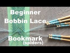 the beginner bobbin lace bookmark spider is made with yarn and wood spools