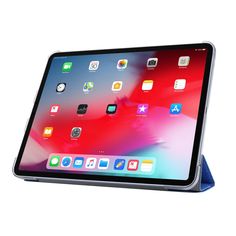 an ipad is sitting on top of a red tabletop with the screen showing icons