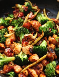 stir fry with chicken and broccoli in a wok