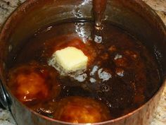 some food is cooking in a pot on the stove